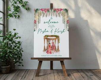 May include: A wedding welcome sign with floral decorations and a watercolor illustration of a couple in traditional Indian attire standing under a mandap. The sign reads "Welcome to the wedding of Nisha & Krish" and "Sunday 27th October 2024".