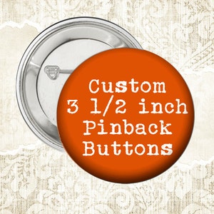 May include: Orange 3 1/2 inch pinback button with white text that reads "Custom 3 1/2 inch Pinback Buttons".