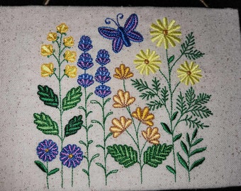 Embroidered wildflowers wall hanging on canvas