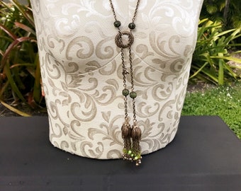 Lariat Necklace with Green Faceted Beads Brass Tulip Flowers Beaded Tassels and a Little Bee Charm