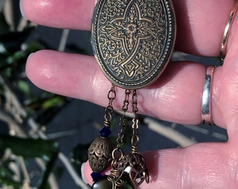 Large Celtic Style Locket with Charms and Beaded Chain