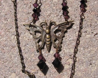 Brass Filigree Butterfly Pendant Necklace with Purple and Black Swarovski