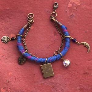 Night Time Theme Bracelet with Cat, Lock, Book Locket, Aurora Borealis Crystal and Moon Charms