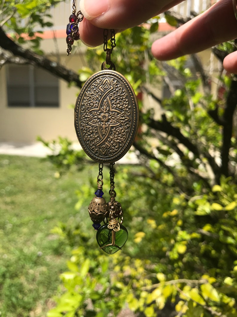 Large Celtic Style Locket with Charms and Beaded Chain