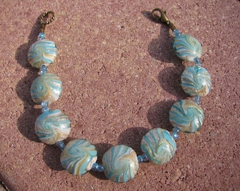 Aqua Swirl Bracelet with Foil Lentil Beads