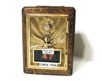 Flying Eagle Post Office Box Bank With 1906 Door and a Bevel Glass Window