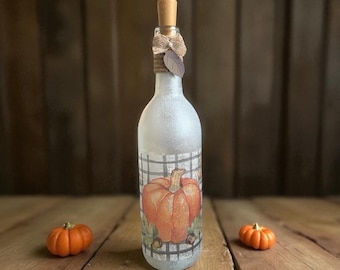 Botella iluminada de calabaza de otoño