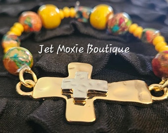 Faith bracelet. Many unique designs available. Check out the Jet Moxie Boutique & get your pieces.