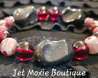 Floral approach bracelet. Many unique designs ranging from classy, chic, to funky. Check out the Jet Moxie Boutique