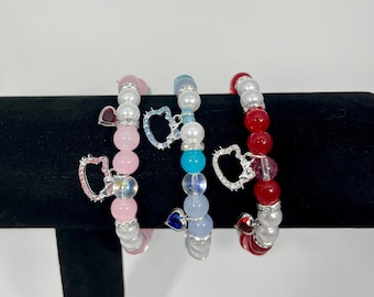 Pulseras de cuentas con forma de gatito y corazón en rosa, azul o rojo