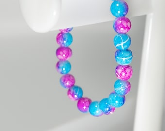 Divertida pulsera de cuentas de colores de algodón de azúcar en azul, blanco y rosa