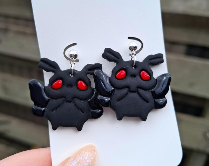 Featured listing image: Handmade Polymer Clay Mothman Earrings