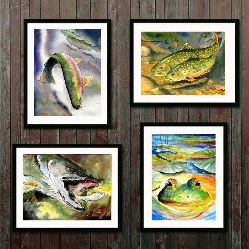 an arrangement of framed aquatic watercolors by well-known fish artist Barry Singer