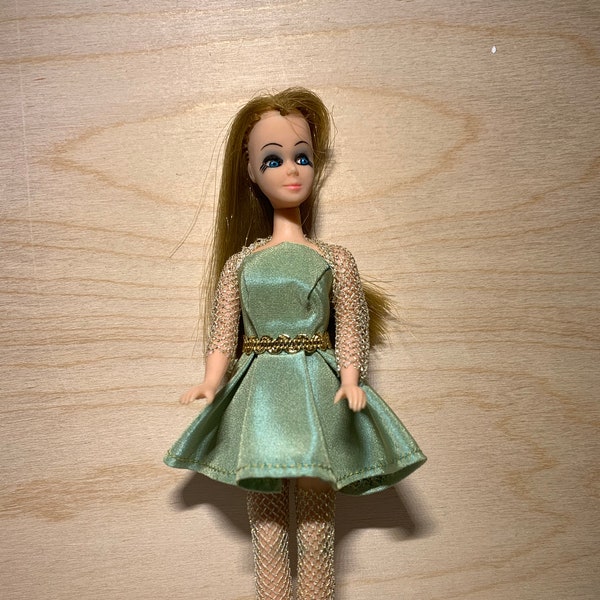 Vintage Topper Dawn Doll Wearing a Custom Pleated Green Mini With Gold Mesh Stockings and Shrug