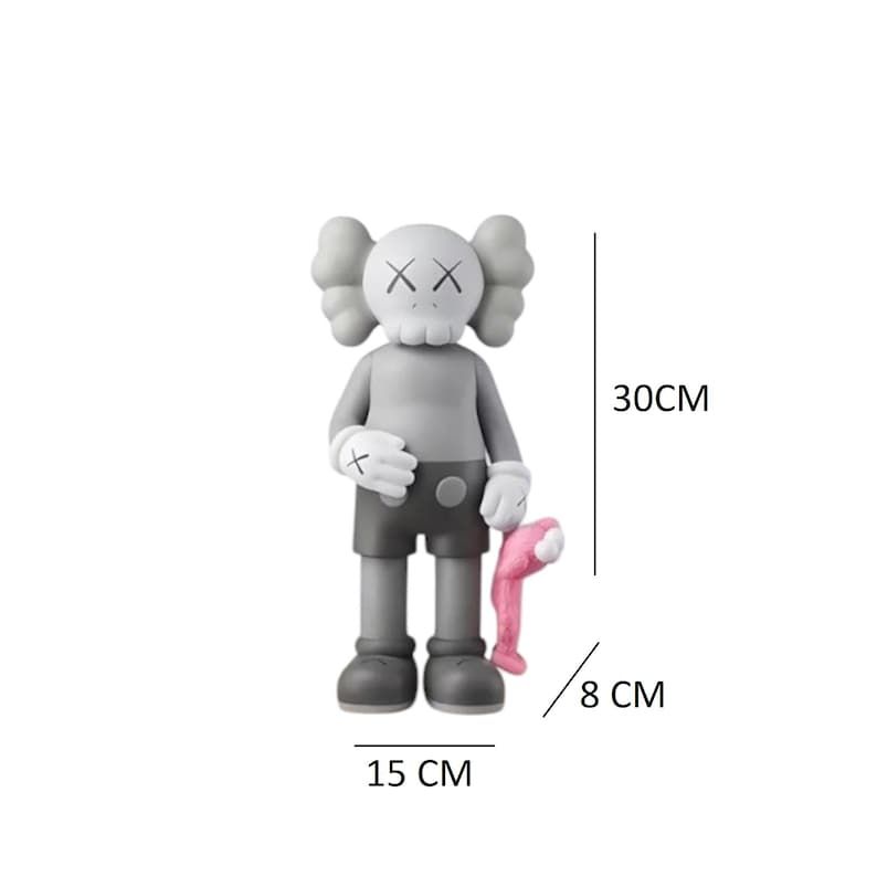 May include: A gray figurine with a distinctive design, featuring a head with crossed-out eyes and a skull-like mouth. The figure is 11.8 inches tall, 5.9 inches wide, and holds a pink object. The figurine's design includes gloves and shorts.