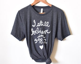 Sample Sale, Size MEDIUM. I still believe in 398.2, Dewey Decimal, Book Lover Gift, Unisex Tshirt. Ready To Ship