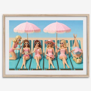 May include: A framed art print depicting six blonde dolls in swimsuits lounging on turquoise beach chairs under two pink and white striped umbrellas. The dolls wear white sunglasses and are engaged in various activities like reading and writing.