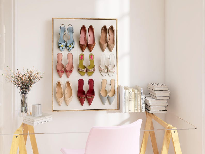 Flat lay illustration of nine pairs of colorful women’s heels arranged in a grid, including floral, pointed-toe, and bow designs – feminine fashion wall art print