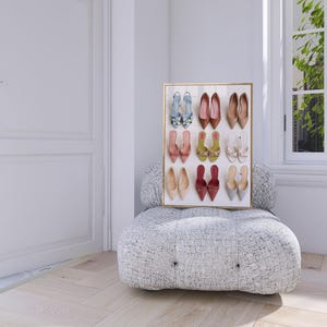Flat lay illustration of nine pairs of colorful women’s heels arranged in a grid, including floral, pointed-toe, and bow designs – feminine fashion wall art print