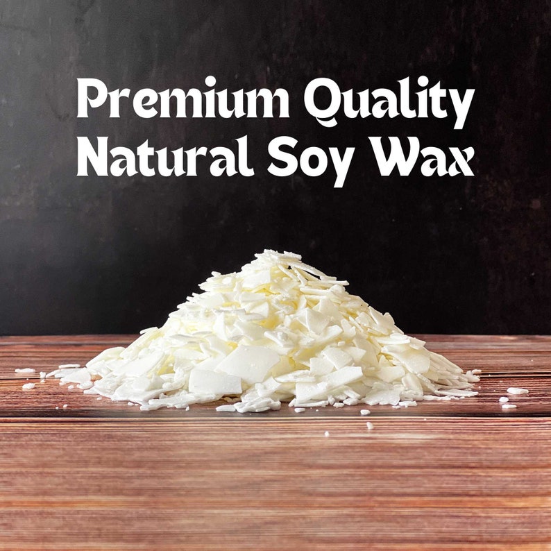 May include: A pile of white soy wax flakes, labeled "Premium Quality Natural Soy Wax" on a dark background.