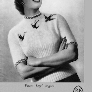 May include: A black and white photo of a woman wearing a white angora sweater with a bird design. The sweater is for a 34 inch bust and is made with Patons Beryl Angora yarn. The text "3-TO FIT 34 INCH BUST-345A" and "Patons Beryl Angora" is visible in the image. The image also includes the logo "P&B WOOLS".