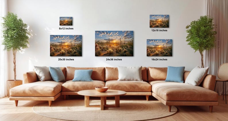 a large, brown sectional sofa with multiple pillows, a wooden coffee table, and a potted plant in the background. The sofa is positioned in front of a wall with three framed landscape photographs of varying sizes, each depicting a different scene.