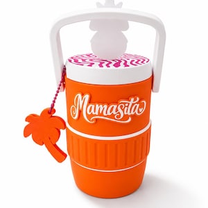 May include: An orange tumbler with a white handle and a clear straw. The lid features a pink and white wavy pattern. The word "Mamasita" is written in white script on the front. An orange palm tree charm hangs from a pink beaded chain.