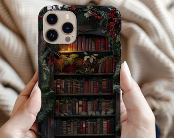 May include: A phone case with a design of a bookshelf filled with books, surrounded by greenery and red berries.