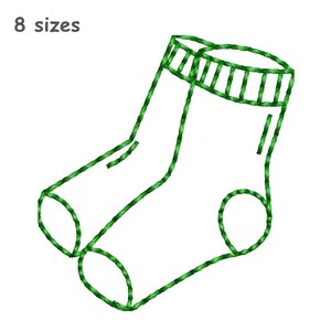 May include: A green embroidered outline of a sock featuring a ribbed cuff and a rounded heel. The design is rendered in a simple stitch pattern against a plain background. The text "8 sizes" is printed in grey in the upper left corner of the image.