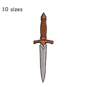 May include: An embroidery design of a dagger with a brown handle and a silver blade, featuring a pointed tip and a crossguard. The text 10 sizes is positioned in the upper left corner. The design is rendered with visible stitching detail.