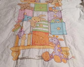 Baby Toys in Dresser Baby Quilt