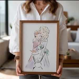 May include: A framed print featuring a watercolor illustration of two animated characters embracing. The artwork is in soft pastel colors, with a wooden frame. The characters are depicted with closed eyes and smiling faces.