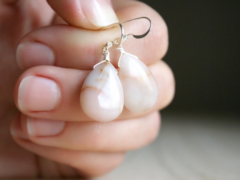Natural Stone Jasper Earrings in a teardrop shape wire wrapped in Sterling Silver on French hook ear wires.