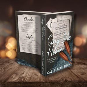 May include: A book titled "Sing Me Home" by Callie Mae Shaw. The cover features musical notes, two oars, and the title in a flowing script. The spine displays the title and author's name. The back cover has text excerpts.