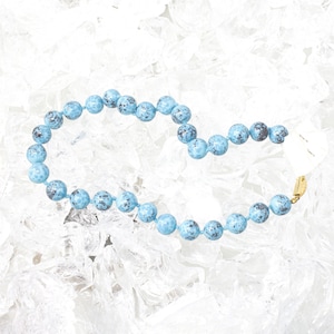 Unique piece! Vintage Murano glass necklace with handmade light blue beads with black artistic decorations, Made in Italy