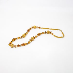 Vintage Murano glass necklace with handmade honey-colored and golden pearls, decorated with aventurine, 80s jewel Made in Italy