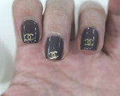 Buy 2 get 1 free. 20 pcs Gold or Silver designer Logo nail art soft metal