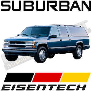 以下が含まれることがあります： 「SUBURBAN」の文字が大きく黒字で書かれた青いSuburban SUV。車両にはルーフラックとクロムアクセントが付いています。画像には「EISENTECH」の文字とドイツの国旗も含まれています。