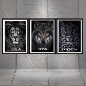 May include: Set of three framed animal portraits: a lion with "HUSTLE", a wolf with "GRIND", and a leopard with "EXECUTION". Each image is in black and white with motivational text at the bottom. The frames are black.