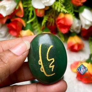 May include: Green stone with a gold symbol, a green stone with a gold symbol, a green stone with a gold symbol, a green stone with a gold symbol, a green stone with a gold symbol, a green stone with a gold symbol, a green stone with a gold symbol, a green stone with a gold symbol, a green stone with a gold symbol, a green stone with a gold symbol.