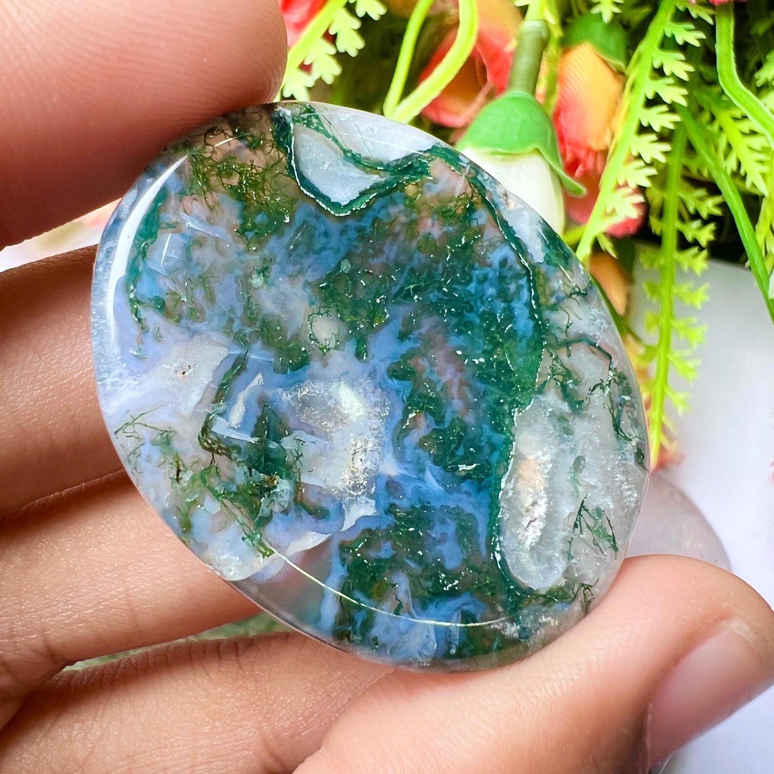 Two moss agate goddess carvings with lush green and lavender hues, for Virgo energy balance