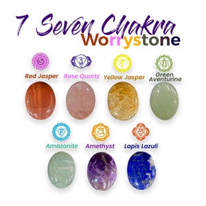 May include: A collection of seven chakra worry stones, each a different color and type of gemstone. The stones include red jasper, rose quartz, yellow jasper, green aventurine, amazonite, amethyst, and lapis lazuli. Text reads "7 Seven Chakra Worrystone".