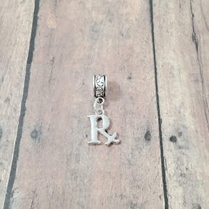 Pandora pharmacy charm best sale