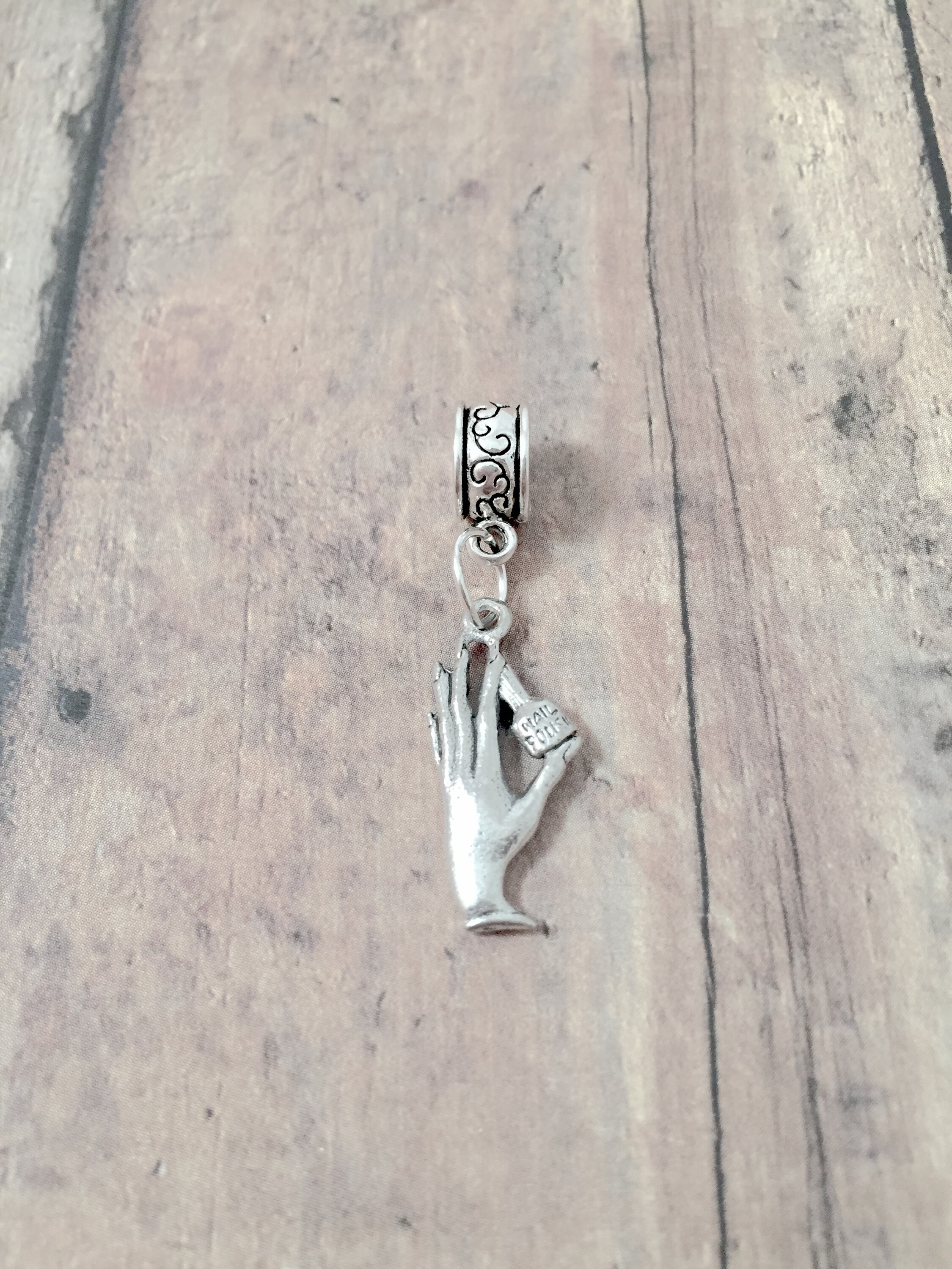 Nail tech pandora charm best sale