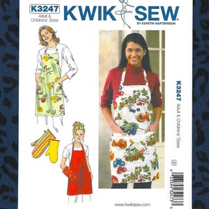 May include: Kwik Sew pattern K3247 for adult and children's aprons. The cover features illustrations of aprons with fruit designs, including lemons, plums, and peaches. The pattern also includes oven mitts. The text "KWIK SEW" is prominently displayed.
