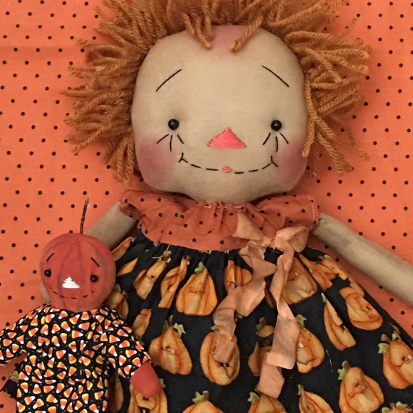 Primitive Raggedy Ann and pumpkin dolly