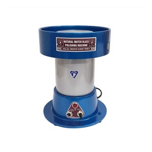 May include: Blue natural watch glass polishing machine with a white glass bowl, a gray cylinder, and a control panel with a red button and two switches. The machine has a diamond logo with the text "Pearl P" on the side. The text "Natural Watch Glass Polishing Machine" and "mfr. by: WATCH CLOCK TOOLS" is printed on the top of the machine.