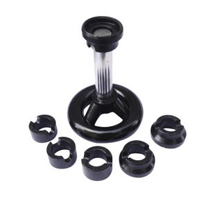 May include: A black metal ring mandrel with a rotating base and five interchangeable ring sizes. The mandrel is used for sizing and shaping rings.