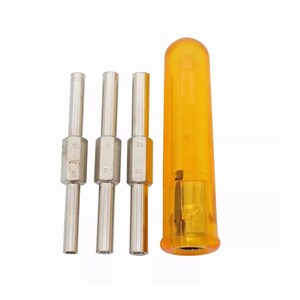 May include: A set of four silver metal tools with a clear orange plastic handle. Three tools have size markings of 5, 7, and 10. The tools are designed for a specific purpose, likely for repair or assembly.