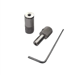 May include: A set of three silver metal tools for making jewelry. The set includes two small, cylindrical tools with knurled edges and a small, L-shaped wrench.